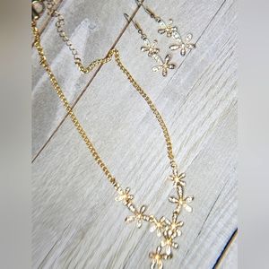 Gold flower earrings and necklace